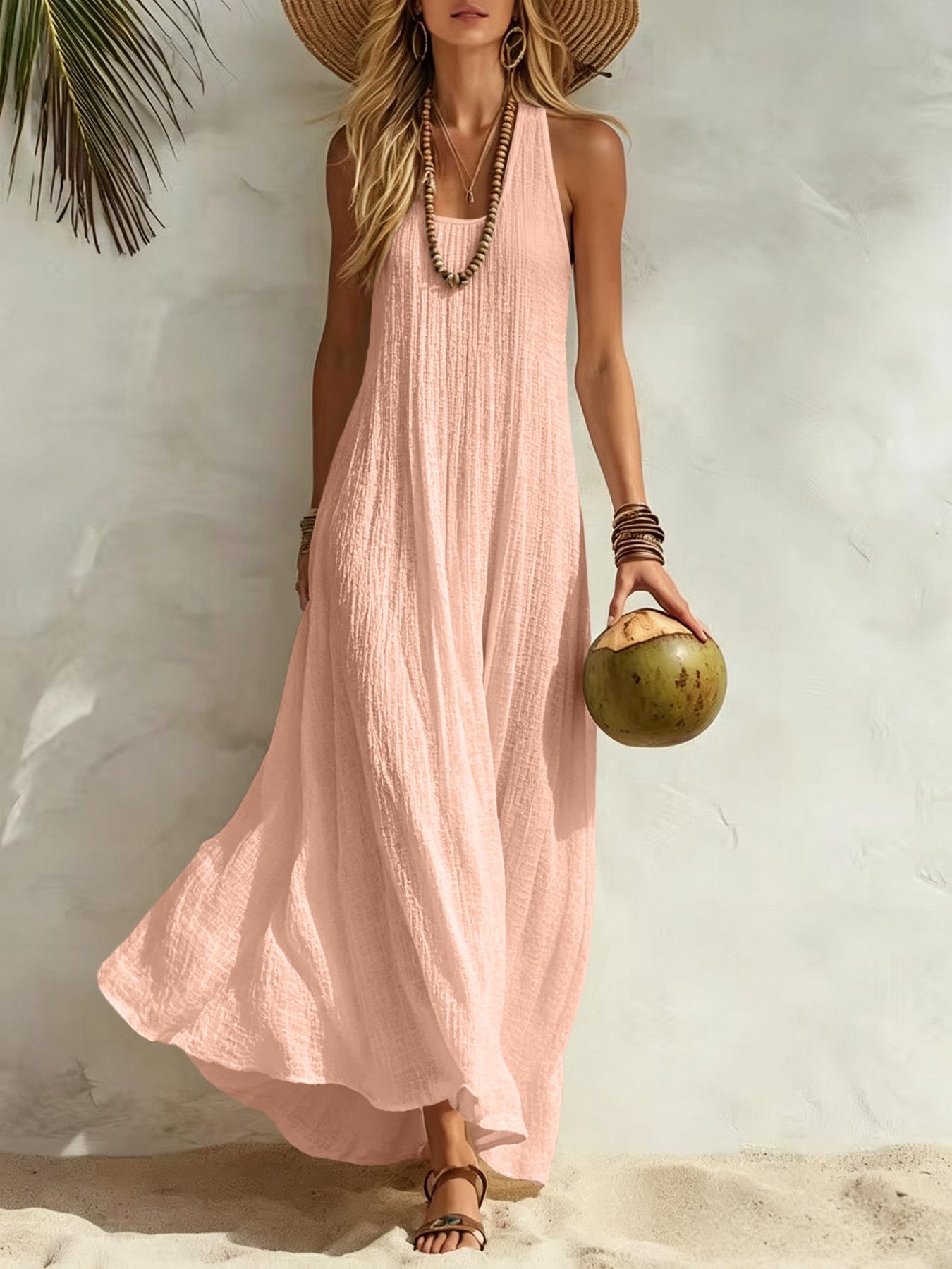 Women’s summer dress with a relaxed Bohemian beach vacation vibe—loose fit that flatters the figure and is comfortable, long length. Women’s summer dress with a relaxed Bohemian beach vacation vibe—loose fit that flatters the figure and is comfortable, long length.