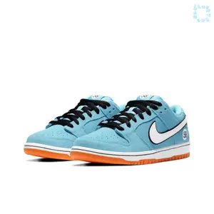 Low-top Skate Sneakers | Light Blue Suede Upper with Black Laces and Circular Numerical Mark Decorative Patch | Three-tone White, Orange Flat Rubber Sole for Daily Street Skating Wear