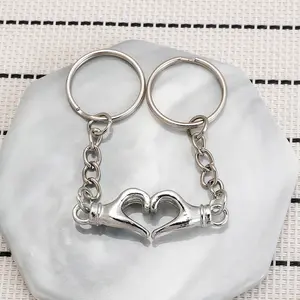 Magnetic heart-hand palm metal keychain couple key ring creative gift for Valentine's Day and Qixi Festival