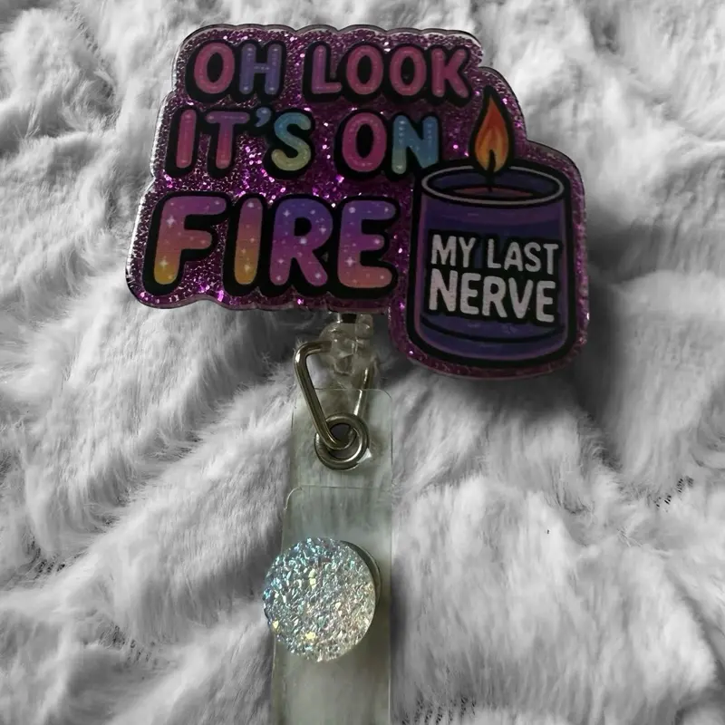 Badge reel retractable