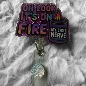 Badge reel retractable