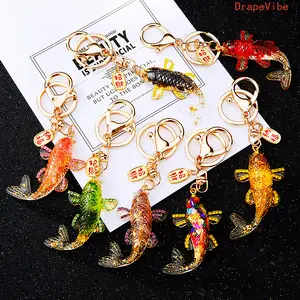 Crystal Koi Fish Keychain, Natural Crystal Resin Craft Lucky Gem Pendant, Stylish Decorative Charm for Car Keys, Bags (Sports & Outdoor, Fan Shop, Gaming Accessory)