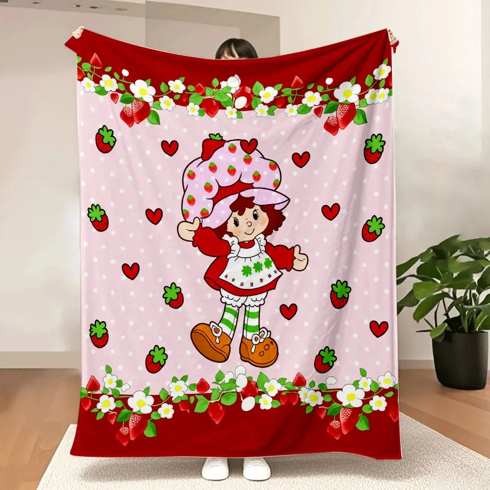 Strawberry Shortcake Blanket—A delightful and cozy blanket featuring the beloved Strawberry Shortcake character surrounded by