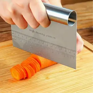 A heavy-duty stainless steel countertop scraper with an internal scale, suitable for baking, making pie crusts and pizza dough, and various pastry preparations.