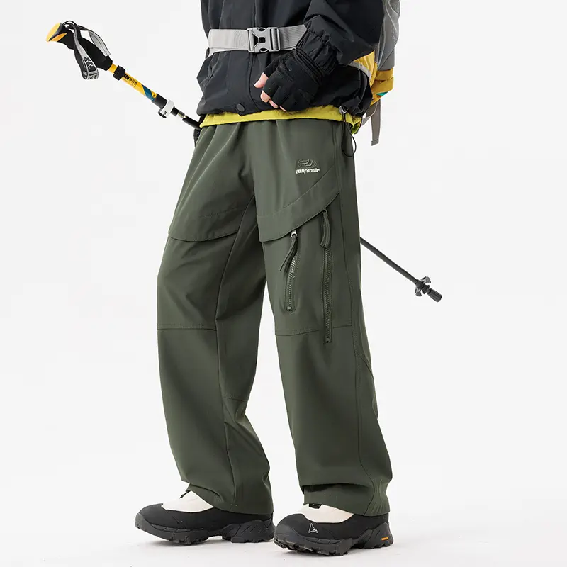 Men’s outdoor functional cargo pants for spring/summer and all seasons, featuring multiple pockets and 3D cutting, windproof and waterproof softshell pants with wide legs in a mountain style for hiking and climbing—fashionable menswear.
