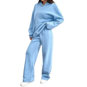 Women’s sage green fleece-lined two-piece loungewear set featuring an oversized cropped hoodie and wide-leg sweatpants—warm casual tracksuit for fall and winter