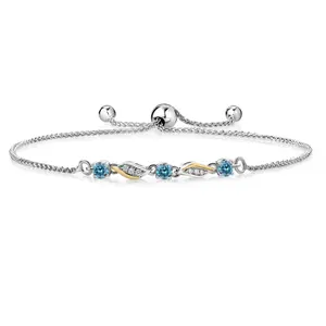 Gem Stone King 925 Silver and 10K Yellow Gold Blue Lab Grown Diamond and Lab Grown Diamond Bracelet For Women | 0.90 Cttw | Gemstone April Birthstone | Round 3.5MM