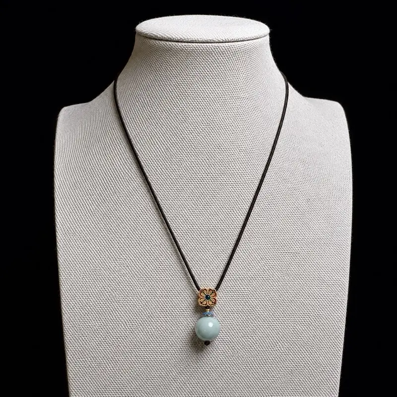 Handcrafted Chinese Celadon Pendant Necklace with Enamel Flower Detail