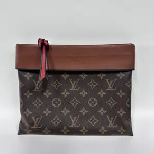 Pre-owned No brand france Clutches & Wristlets LV monogrammed brown clutch bag (SZ 69322)