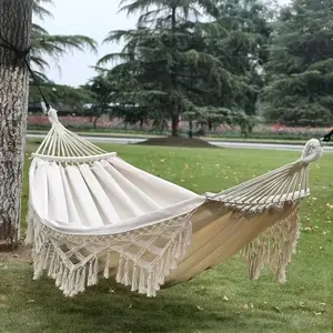 Double hammock, Canvas camping hammock, designed for two people, with tassels and maximum load-bearing limit, made of Bohemian style canvas. It includes thick ropes and a portable bag, perfect for outdoor use, gardens