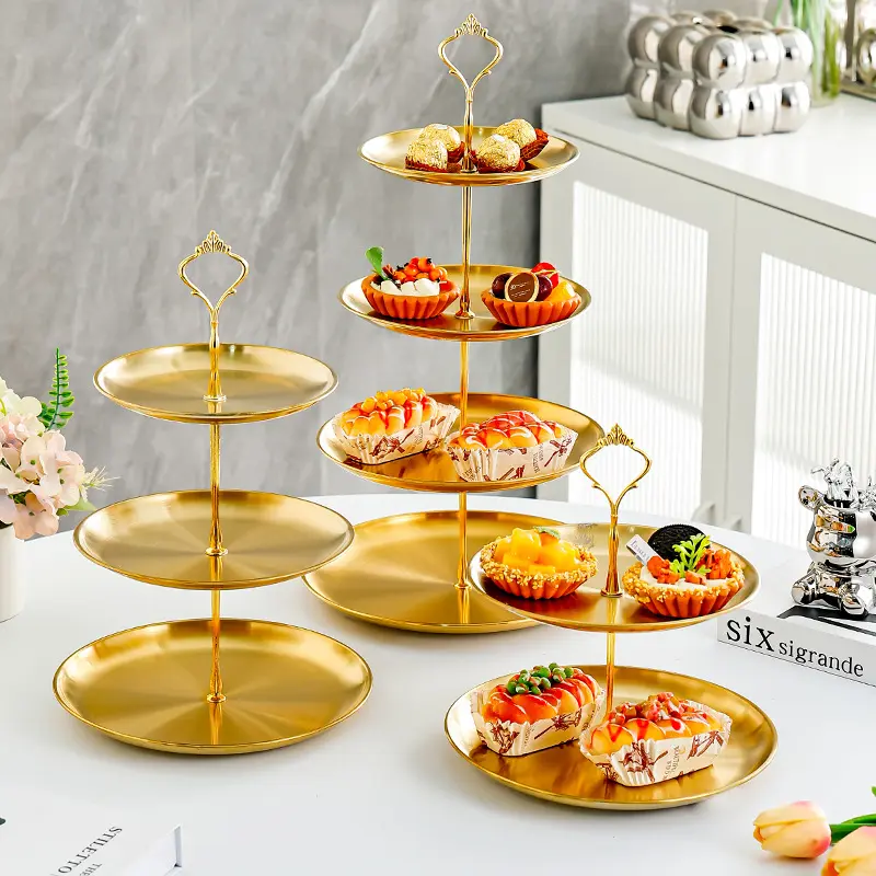 A gold stainless steel 3-layer cupcake rack, stainless steel cup display tower, cake rack, dessert tray, cake, fruit and candy display rack, desktop decoration for Christmas, wedding, birthday, baby shower, tea party plates