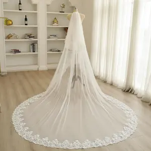 Elegant church-style mantilla veil with delicate floral lace trim and sheer tulle, perfect for weddings.