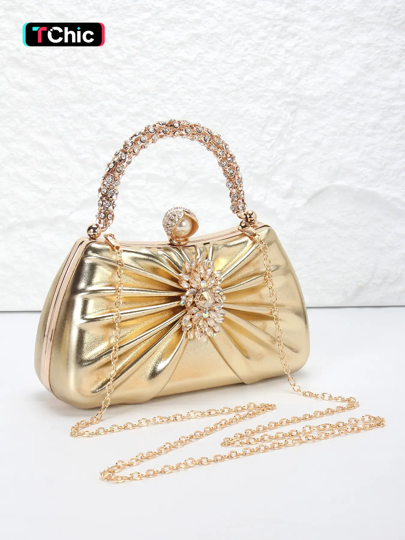 Pleated PU leather ladies' evening clutch, Fashionable Embellished Clutch, Elegant rhinestone bag, with detachable long chain strap for crossbody wear, adorned with crystal-embellished handles and a pearl clasp, ideal for weddings, parties