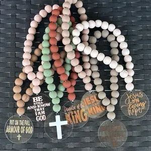 ROOTED IN CHRIST 2in acrylic round- wooded beads car charm