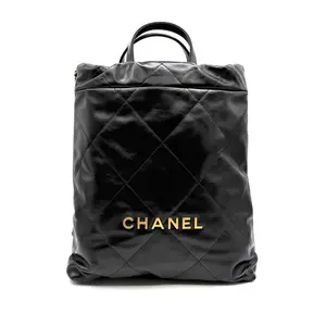 Pre-owned CHANEL Leather Backpacks 22 backpack in black shiny calfskin leather