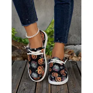 Women’s Halloween breathable non-slip canvas sneakers with pumpkin and ghost pattern, round toe, easy elastic lace-up closure walking shoes