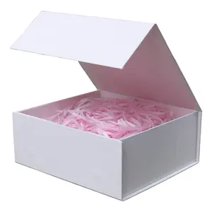 White gift box with lid, measuring 9.7 x 7.2 x 3.3 inches, suitable for gift wrapping, with magnetic closure, perfect for occasions such as weddings, birthdays, and graduations.
