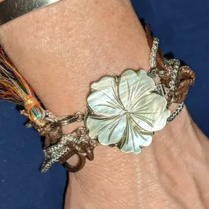 Mother of Pearl Floral and Tassel multi band bracelet