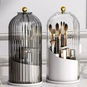 Birdcage-shaped makeup brush holder with vertical-striped cover, featuring a 360° rotating dust-proof storage box, Makeup Organizer Box. Accommodates large quantities of cosmetics and toothbrushes, ideal for vanity tables and bathroom countertops.