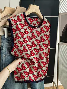 One piece, Womenswear, Women's spring/summer loose-fit round-neck sleeveless knitted top, perfect for back-to-school style. Features contrast dark blue trim, leafy prints with red bow accents. Ideal for outdoor wear - throw on a vest or rock it solo!