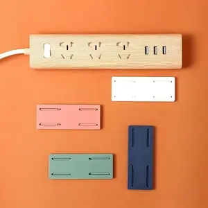 4pcs Punch-Free Adhesive Socket Rack, Wall-Mounted Power Strip Bracket, Traceless Self-Sticking Wall Hanger, Multipurpose Storage Organizer for Remote Control, Router, Tissue Box, Mixed Colors