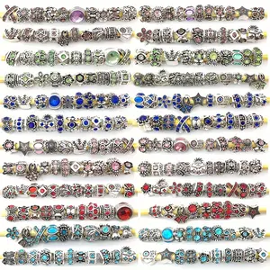 A box of alloy accessories, various large hole spacing beads, with metal alloy rhinestones, used for DIY pendant bracelet jewelry production