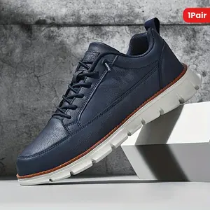 A pair of men's casual skateboard shoes - single color low-top round toe with faux leather upper, cloth lining, MD sole, cloth insole - comfortable and stylish for daily wear