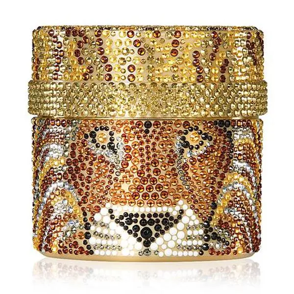 PRAI Beauty Ageless Throat & Decolletage Night Creme in Gold Lion Jar
