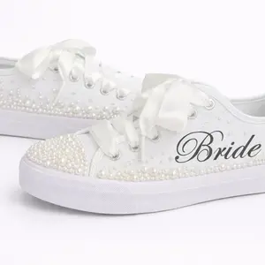 Personalized white bridal shoes. Send name for personalization