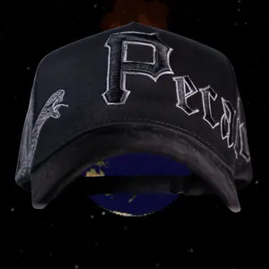 Pecador Legacy Cap on Black with Text and Graphic Design