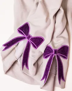 Sandstone Embroidered Side Bows Unisex NuBlend Crew Sweatshirt