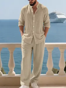 Loose-fit men's Plain Breathable Natural linen suit outfit, long-sleeved linen shirt paired with linen trousers. Suitable for casual summer wear, ideal for vacations and festivals. Fashionable and comfortable.