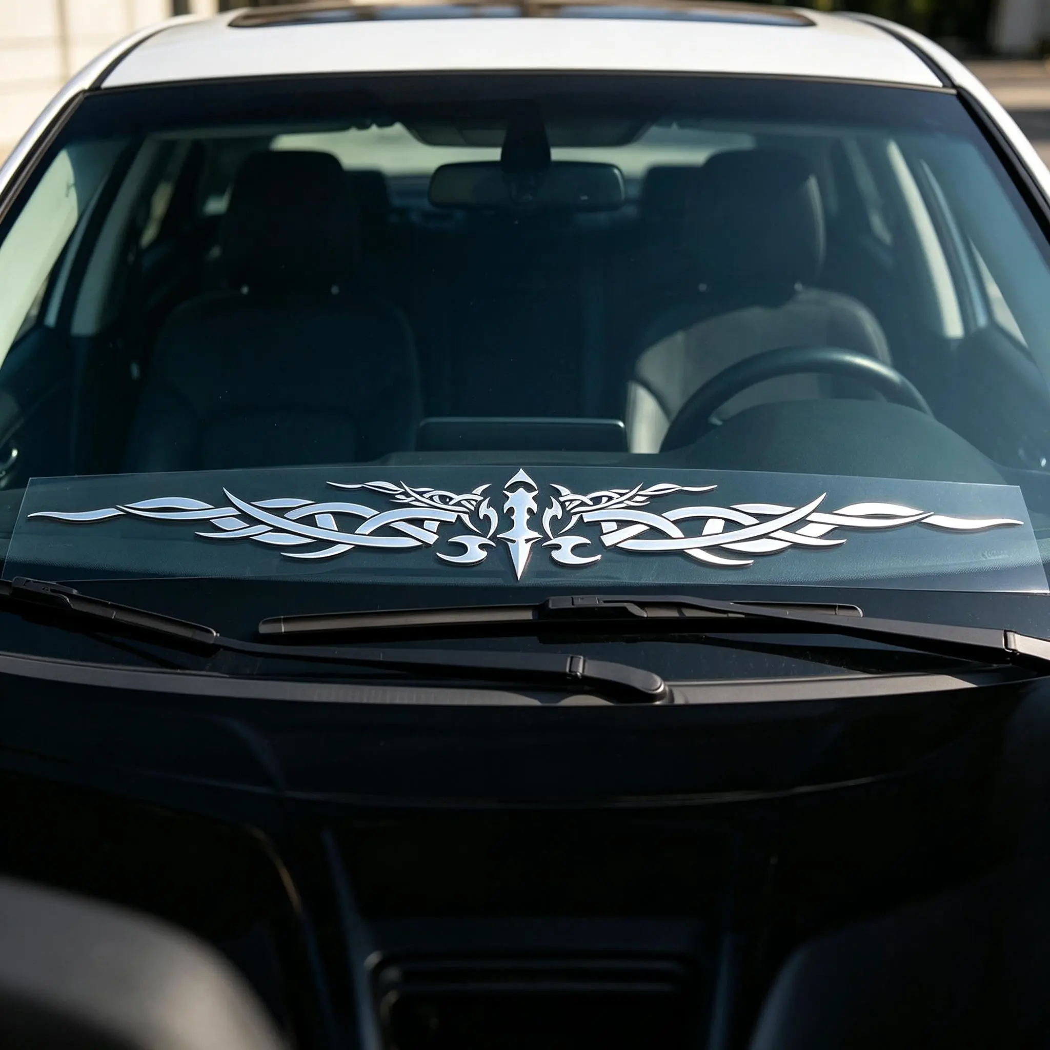 Long horizontal decal for the car windshield featuring a totem design