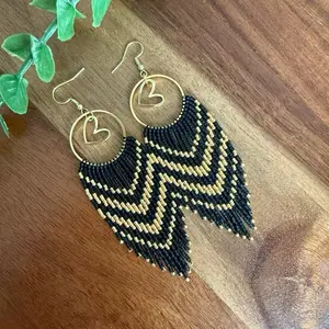 Handmade Beaded Dangle Earrings with Gold Heart Accent and Black and Gold Zigzag Pattern