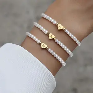 FASHION4U - 26 Letters Initial Bracelet For Women Faux Pearl Bracelet Fashion Women link Bracelet Wristband Jewelry gift Pearl Bracelet A-Z