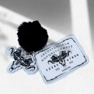 Ouija board keychain with skull charm. White with white charm black  décor
