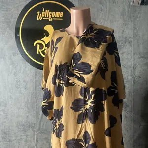 Dera with Hijab Somali Dress Summer Dress in Vibrant Yellow with Bold Black Floral Print for Stylish Comfort
