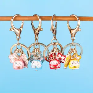 1/20pcs Cherry Blossom Lucky Cat Keychain - Round Ceramic Charm with Floating Design, Secure Clasp for Sports Fans