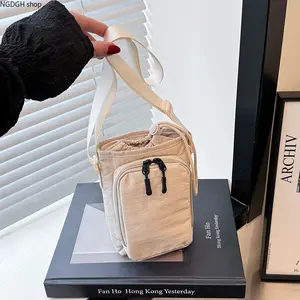 Beige Water Bottle Crossbody Bag, Drawstring & Zipper Pockets, Adjustable Strap, Lightweight Nylon, Perfect for Hiking, Travel, Walks & Keeping Your Drink & Essentials Hands-Free