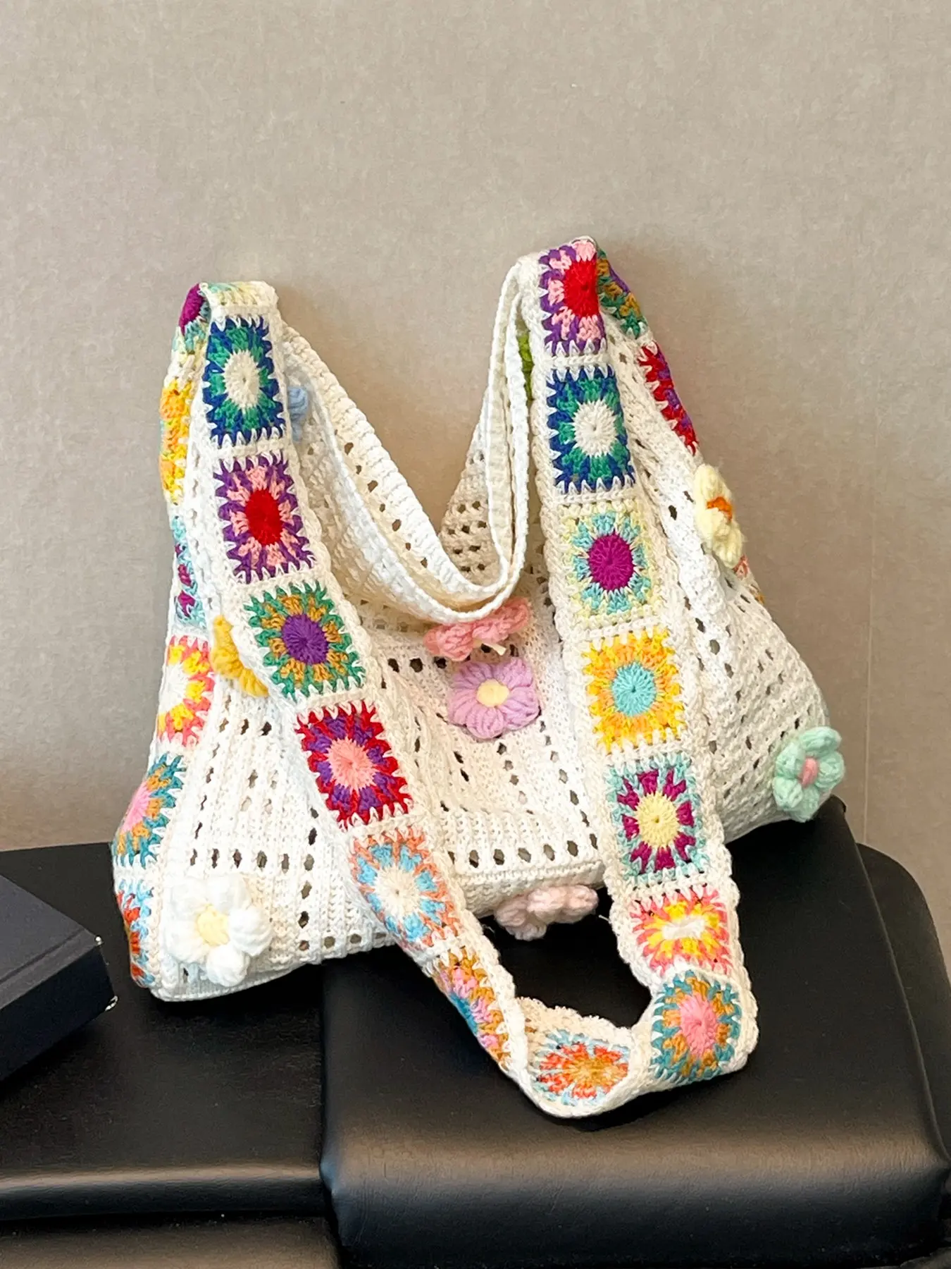 Fresh and stylish personalized handmade crochet tote bag, Handcrafted bag, a versatile and casual large capacity shoulder bag with rainbow petals and hollow design, wide shoulder straps, suitable for traveling, shopping, and socializing