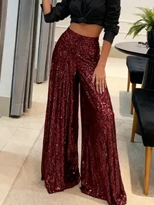 A women's wide-leg loose and flowy pants with a forgiving fit, featuring an elastic waist and fashionable sequin design, suitable for spring and summer, and versatilerious styles including evening parties, fashion red carpets, and more.