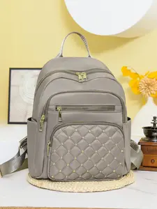 Small design multi-pocket rivet design backpack, large capacity and durable leisure outdoor travel commuter backpack, Casual travel backpack, Stylish daypack