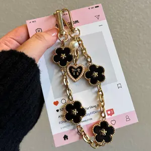 Aesthetic Flower Bead Phone Wristlet Strap Metal Luxury Lucky Charm Phone Charm Anti-Lost Keychain Wristlet Lanyard Compatible with All Phone Cases Trendy Y2K Fashion Jewelry Accessory Floral Cellphone