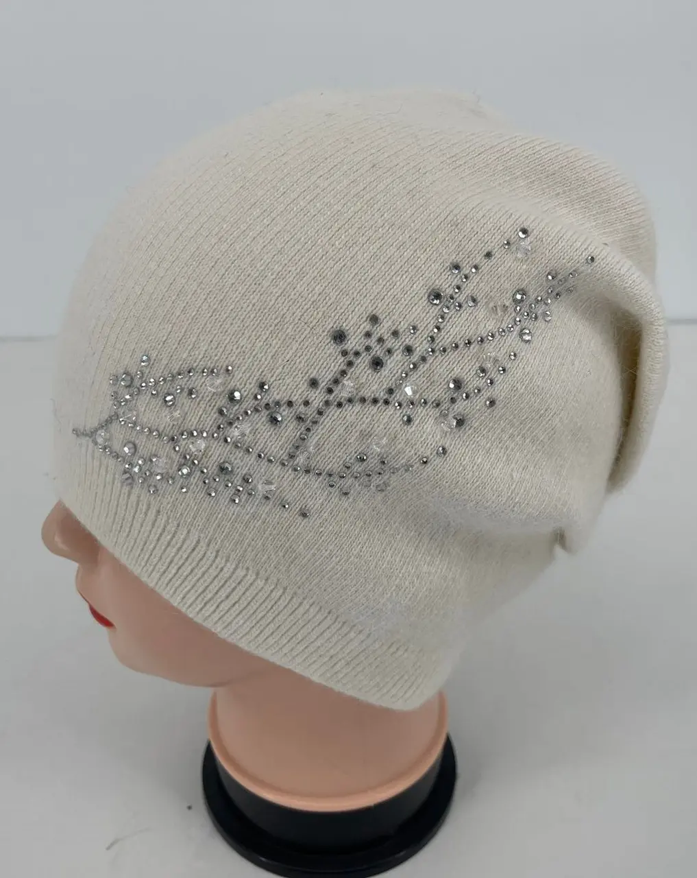 WINTER MUSE BEANIE; A soft beanie adorned with delicate rhinestones in a leaf design