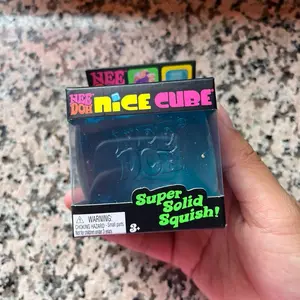 NeeDoh Nice Cube - Satisfying Cube Squeeze Toy - Soft Squeeze Toy in Assorted Colors - Fun for Ages 3 and Up Soft Squishy Sensory Cuddle Box