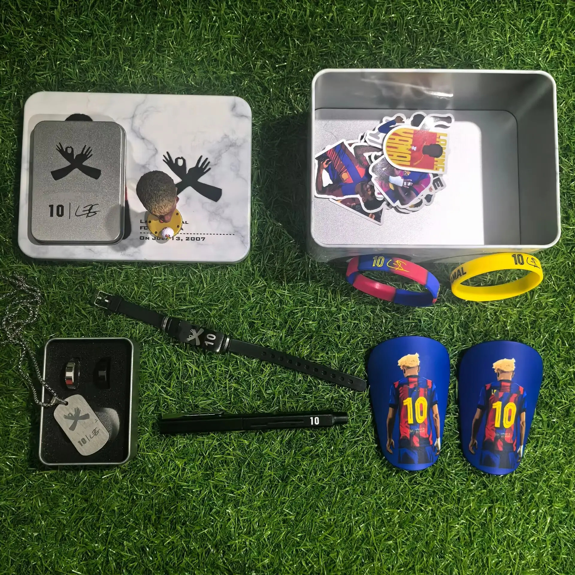 Soccer Star Number 10 Gift Bundle - 1 Gift Box, 50 Stickers, 1 Figure, 1 Pen, 1 Necklace, 2 Rings, 1 Pair of Mini Shin Guards(10cm*6cm), 2 Wristbands