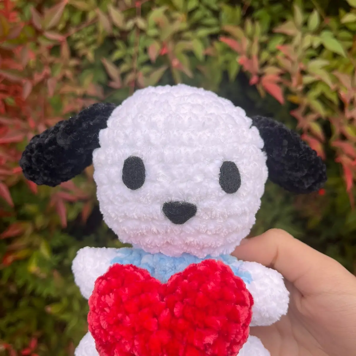 Crochet Pochacco holding a heart plush <3