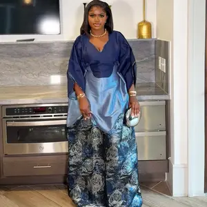 Olori Elegant Mixmatch boubou dress embellished with brocade fabric for women to standout in any occasion.comes with a headtie and a cinching inner belt.