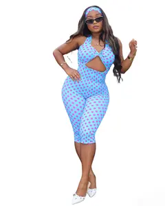 Sexy polka dot romper for women with a flattering bodycon fit, bold front cutout, and stretchy fabric. Perfect for summer outfits, parties, vacations, and streetwear looks. Y2K inspired style with matching headband.