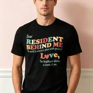 "Dear Resident Behind Me" Graphic T-Shirt - Funny Nursing Home Staff Statement Top - Medical Humor Elderly Care Aesthetic Apparel - Comfortable Short Sleeve Graphic Shirt - Unique Professional Detail Crew Neck Tee